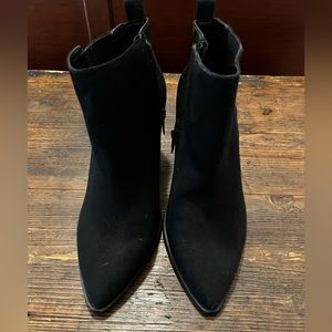 torrid black suede cowboy boots .